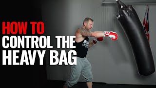 How to Hit the Heavy Bag Properly So It will not Swing [upl. by Leelaj719]