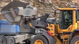 Volvo L90H  Loading Scania and Volvo trucks in quarry [upl. by Monte]